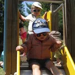 Child on a tobbogan - Maison des enfants